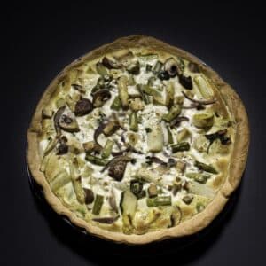 Homemade asparagus quiche baked until golden and ready to serve.