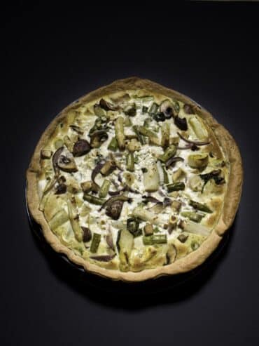 Homemade asparagus quiche baked until golden and ready to serve.