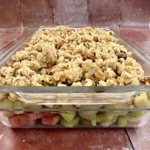 healthy rhubarb crumble with crunchy nut topping baked until golden